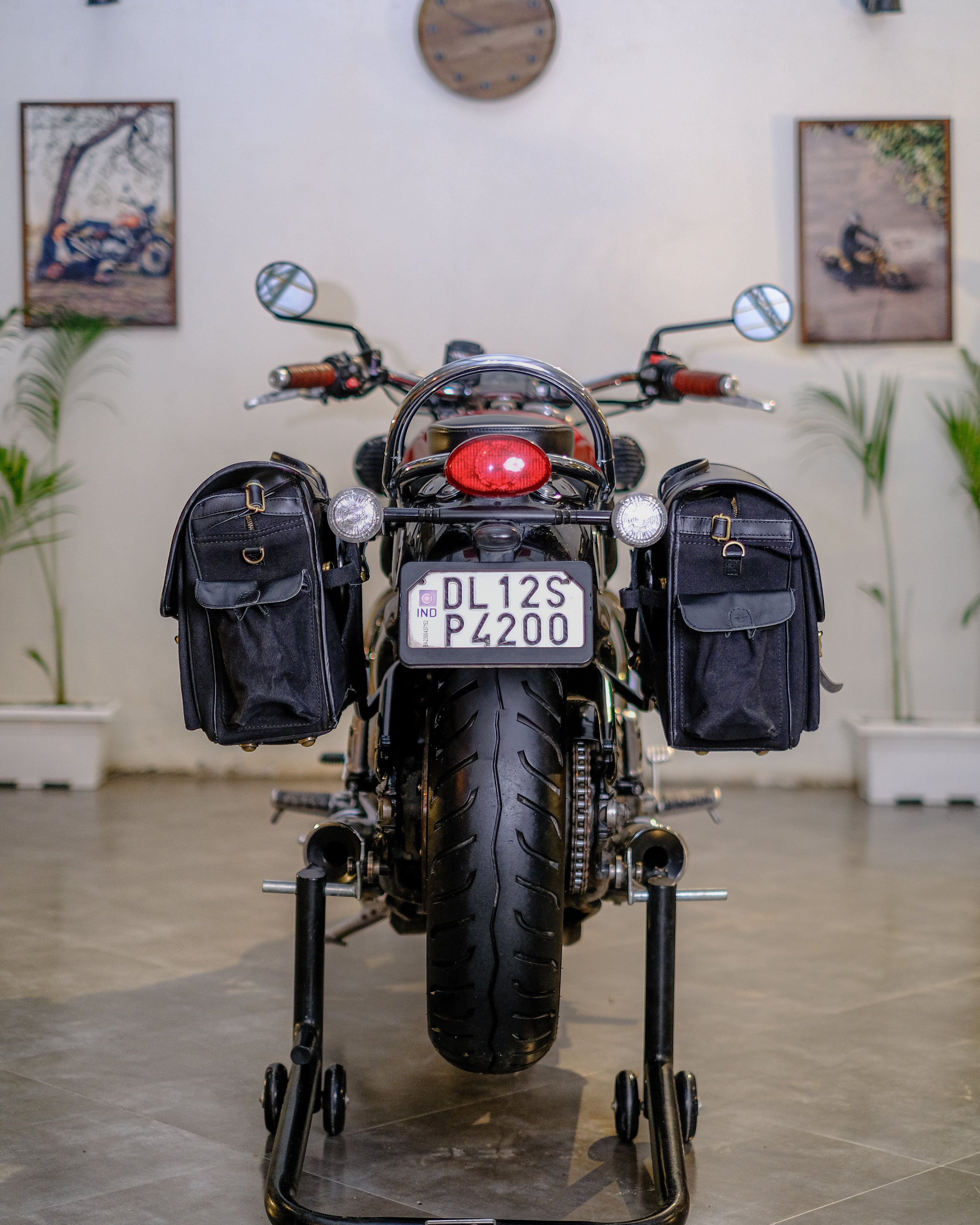 Motorcycle with saddlebags on a stand indoors