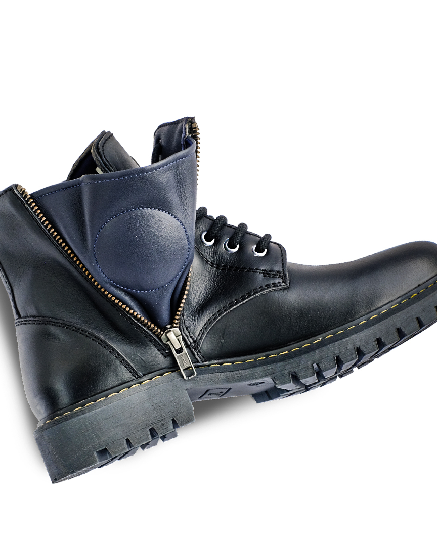 Black leather boots with a zipper on a white background